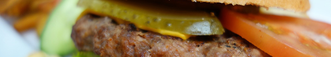 Eating Burger at Jay & Diane's Horseshoe Grill restaurant in Canyon Lake, TX.